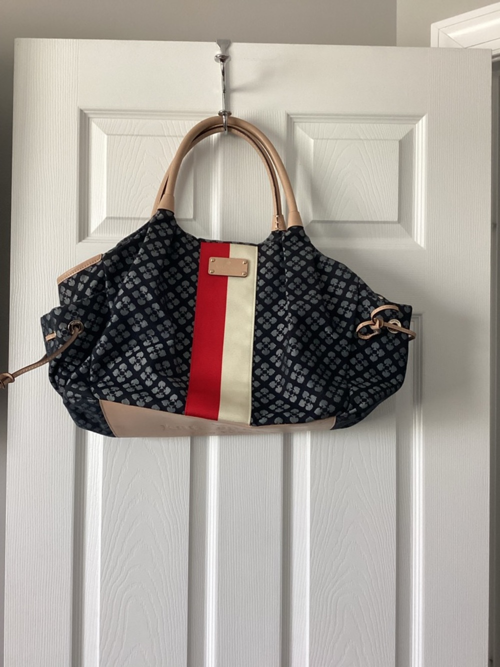 kate spade patterned baby bag in navy with red lining
